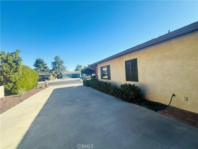 Charming 3-bedroom, 2-bath home located right on the golf on Green Tree Golf Course in California - for sale on GolfHomes.com, golf home, golf lot