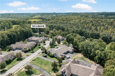 Discover your new home in a delightful two-story condo nestled on Pittsburgh National Golf Club in Pennsylvania - for sale on GolfHomes.com, golf home, golf lot