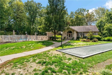 Discover your new home in a delightful two-story condo nestled on Pittsburgh National Golf Club in Pennsylvania - for sale on GolfHomes.com, golf home, golf lot