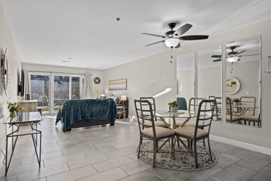 Wake up to the gentle shimmer of Lake Taneycomo right outside on Pointe Royale Village Country Club in Missouri - for sale on GolfHomes.com, golf home, golf lot