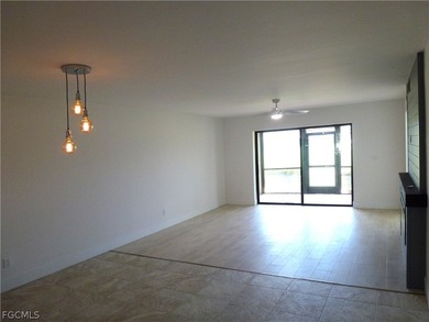 This 2 bedroom with a den 2 bathroom condo on the 1st floor is on  in Florida - for sale on GolfHomes.com, golf home, golf lot