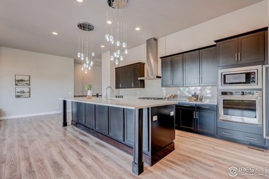 Skip the wait and move right into a fully customized luxury on Raindance National Golf Course in Colorado - for sale on GolfHomes.com, golf home, golf lot