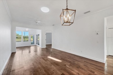 One or more photo(s) has been virtually staged. WELCOME HOME TO on Pelican Pointe Golf and Country Club in Florida - for sale on GolfHomes.com, golf home, golf lot