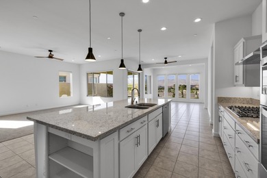 Come see the VIEWS, the UPGRADES, and the unmatched LIFESTYLE on Mission Hills Golf Club in California - for sale on GolfHomes.com, golf home, golf lot