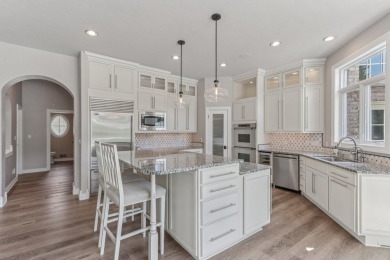 Gorgeous all brick masterpiece located on PRIVATE deep lot on The Legend At Bristlecone in Wisconsin - for sale on GolfHomes.com, golf home, golf lot