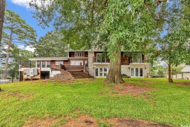 This is HOME! This beautiful property is located in the Green on Arcadian Shores Golf Club in South Carolina - for sale on GolfHomes.com, golf home, golf lot