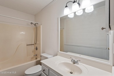 CHARM & CHARACTER ABOUND! This charming home will absolutely on Carolina Shores Golf Course in North Carolina - for sale on GolfHomes.com, golf home, golf lot