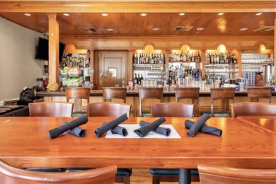 One or more photo(s) has been virtually staged. PRICE ADJUSTMENT on Pelican Pointe Golf and Country Club in Florida - for sale on GolfHomes.com, golf home, golf lot