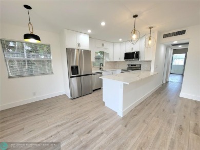 Beautifully renovated 2 bedroom 2 bathroom condo in the heart of on Kings Point Golf - Executive in Florida - for sale on GolfHomes.com, golf home, golf lot