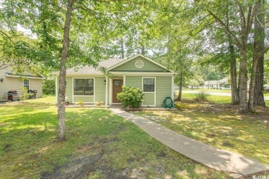 Step into the serene oasis of Myrtle Beach Golf & Yacht, a on Heron Point Golf Club in South Carolina - for sale on GolfHomes.com, golf home, golf lot