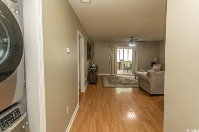 Step into the serene oasis of Myrtle Beach Golf & Yacht, a on Heron Point Golf Club in South Carolina - for sale on GolfHomes.com, golf home, golf lot