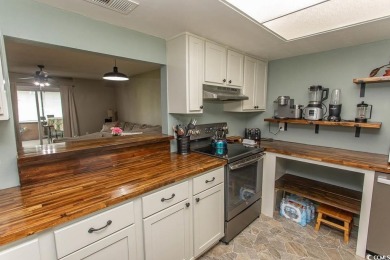 Step into the serene oasis of Myrtle Beach Golf & Yacht, a on Heron Point Golf Club in South Carolina - for sale on GolfHomes.com, golf home, golf lot