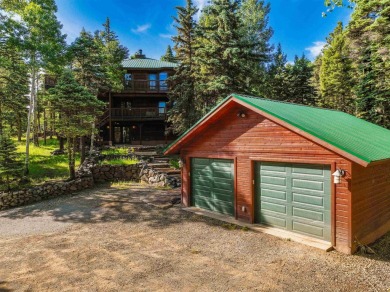 Tucked away amid whispering pines and just a short walk to the on Angel Fire Resort Country Club in New Mexico - for sale on GolfHomes.com, golf home, golf lot