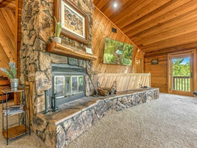 Tucked away amid whispering pines and just a short walk to the on Angel Fire Resort Country Club in New Mexico - for sale on GolfHomes.com, golf home, golf lot