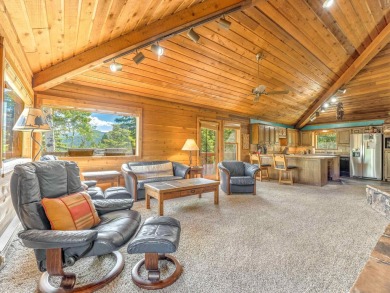 Tucked away amid whispering pines and just a short walk to the on Angel Fire Resort Country Club in New Mexico - for sale on GolfHomes.com, golf home, golf lot
