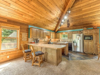 Tucked away amid whispering pines and just a short walk to the on Angel Fire Resort Country Club in New Mexico - for sale on GolfHomes.com, golf home, golf lot