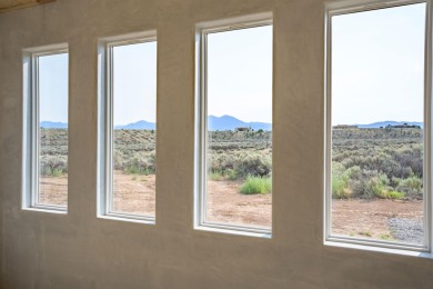 Have you ever desired to reside near a golf course, but avoided on Taos Country Club in New Mexico - for sale on GolfHomes.com, golf home, golf lot