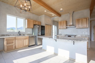 Have you ever desired to reside near a golf course, but avoided on Taos Country Club in New Mexico - for sale on GolfHomes.com, golf home, golf lot