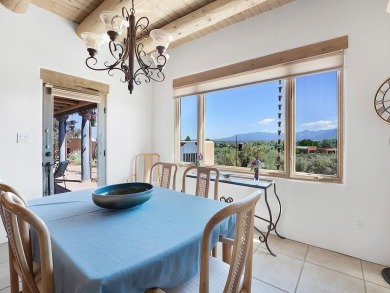 This exceptional adobe-style home, with a stucco exterior and on Taos Country Club in New Mexico - for sale on GolfHomes.com, golf home, golf lot