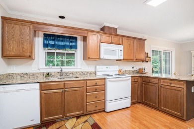 This wonderful waterfront 2-bedroom, 2-bath home blends comfort on Eagle Nest Golf Club in South Carolina - for sale on GolfHomes.com, golf home, golf lot