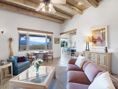 This exceptional adobe-style home, with a stucco exterior and on Taos Country Club in New Mexico - for sale on GolfHomes.com, golf home, golf lot