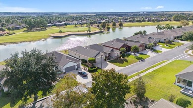 Fall in love with the STUNNING LAKE AND GOLF COURSE VIEWS that on Stone Creek Golf Club in Florida - for sale on GolfHomes.com, golf home, golf lot