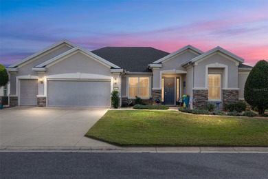 Fall in love with the STUNNING LAKE AND GOLF COURSE VIEWS that on Stone Creek Golf Club in Florida - for sale on GolfHomes.com, golf home, golf lot