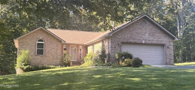 Brick Basement Ranch with two car garage on main level and on Lake Tansi Village Country Club in Tennessee - for sale on GolfHomes.com, golf home, golf lot