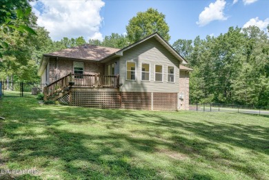Brick Basement Ranch with two car garage on main level and on Lake Tansi Village Country Club in Tennessee - for sale on GolfHomes.com, golf home, golf lot