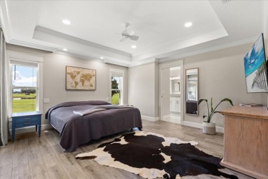 Welcome to this thoughtfully designed home on Deer Island, where on Deer Island Country Club in Florida - for sale on GolfHomes.com, golf home, golf lot