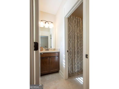 Discover easy living in this beautifully designed four bedroom on Lanier Island Legacy Golf Couorse in Georgia - for sale on GolfHomes.com, golf home, golf lot