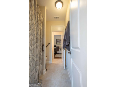 Discover easy living in this beautifully designed four bedroom on Lanier Island Legacy Golf Couorse in Georgia - for sale on GolfHomes.com, golf home, golf lot