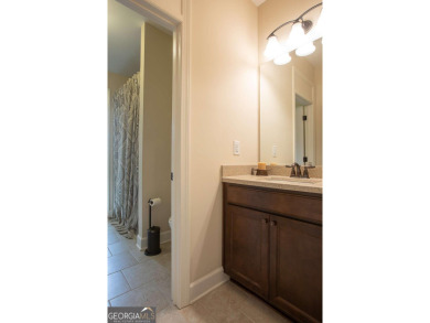 Discover easy living in this beautifully designed four bedroom on Lanier Island Legacy Golf Couorse in Georgia - for sale on GolfHomes.com, golf home, golf lot