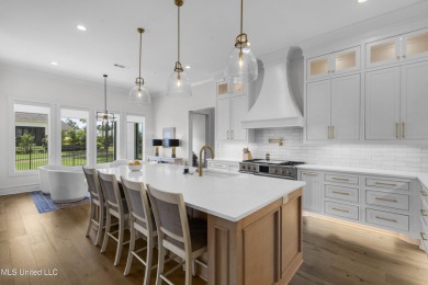 Experience resort-style living in this exceptional residence on Reunion Golf Club in Mississippi - for sale on GolfHomes.com, golf home, golf lot