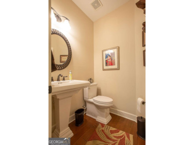 Discover easy living in this beautifully designed four bedroom on Lanier Island Legacy Golf Couorse in Georgia - for sale on GolfHomes.com, golf home, golf lot