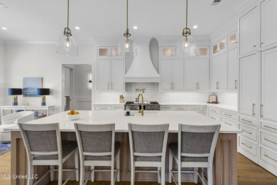 Experience resort-style living in this exceptional residence on Reunion Golf Club in Mississippi - for sale on GolfHomes.com, golf home, golf lot
