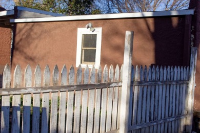 Welcome to this charming historic home that blends classic on Spring River Golf Course in New Mexico - for sale on GolfHomes.com, golf home, golf lot