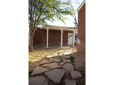 Welcome to this charming historic home that blends classic on Spring River Golf Course in New Mexico - for sale on GolfHomes.com, golf home, golf lot