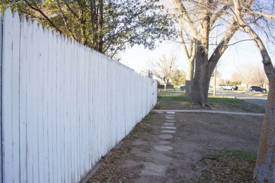 Welcome to this charming historic home that blends classic on Spring River Golf Course in New Mexico - for sale on GolfHomes.com, golf home, golf lot