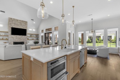Experience resort-style living in this exceptional residence on Reunion Golf Club in Mississippi - for sale on GolfHomes.com, golf home, golf lot