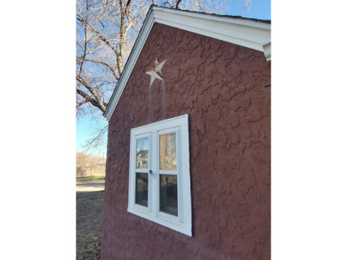 Welcome to this charming historic home that blends classic on Spring River Golf Course in New Mexico - for sale on GolfHomes.com, golf home, golf lot