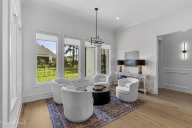 Experience resort-style living in this exceptional residence on Reunion Golf Club in Mississippi - for sale on GolfHomes.com, golf home, golf lot