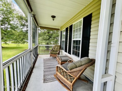 You wont want to miss this bright and airy 5 bedroom, 2 1/2 bath on Rock Creek Country Club in North Carolina - for sale on GolfHomes.com, golf home, golf lot