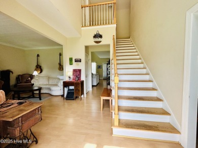 You wont want to miss this bright and airy 5 bedroom, 2 1/2 bath on Rock Creek Country Club in North Carolina - for sale on GolfHomes.com, golf home, golf lot