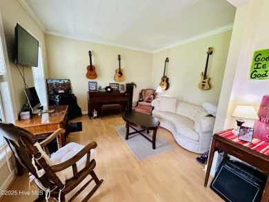 You wont want to miss this bright and airy 5 bedroom, 2 1/2 bath on Rock Creek Country Club in North Carolina - for sale on GolfHomes.com, golf home, golf lot