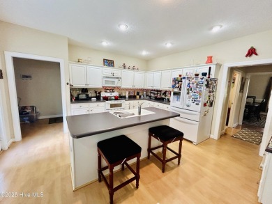 You wont want to miss this bright and airy 5 bedroom, 2 1/2 bath on Rock Creek Country Club in North Carolina - for sale on GolfHomes.com, golf home, golf lot