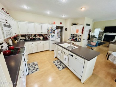 You wont want to miss this bright and airy 5 bedroom, 2 1/2 bath on Rock Creek Country Club in North Carolina - for sale on GolfHomes.com, golf home, golf lot