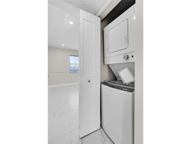 REAL OPPORTUNITY!! COMPLETELY RENOVATED, 2 BEDS- 2 BATHS MODERN on Wynmoor Golf Course in Florida - for sale on GolfHomes.com, golf home, golf lot