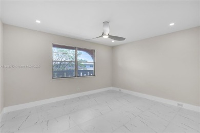 REAL OPPORTUNITY!! COMPLETELY RENOVATED, 2 BEDS- 2 BATHS MODERN on Wynmoor Golf Course in Florida - for sale on GolfHomes.com, golf home, golf lot