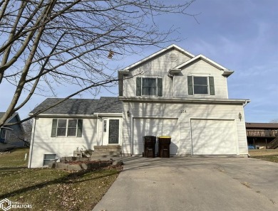 This 1 1/2 story home has style and design appeal!  Main level on Osceola Country Club in Iowa - for sale on GolfHomes.com, golf home, golf lot